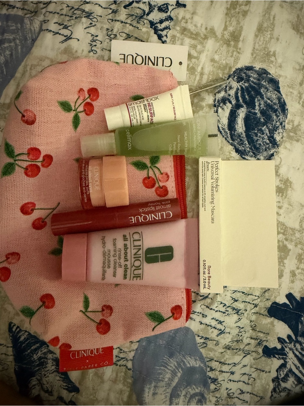 Clinique Pink Cherry Cosmetic Pouch with Travel-Sized Skincare & Lip Treatments